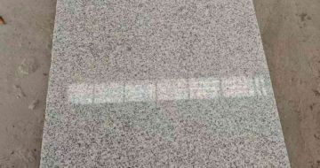 丽江芝麻白光面毛板